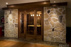 Stone Entrance for Wine Cellar with Walnut Custom Door SL