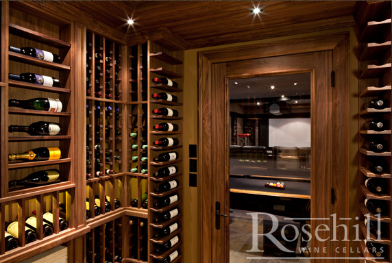 wall anchored wooden racks on a wine cellar