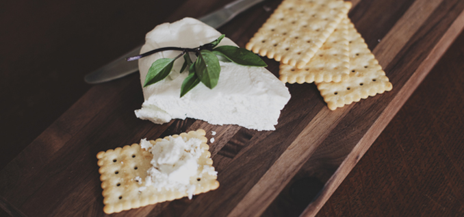 Cream cheese spread on cracker