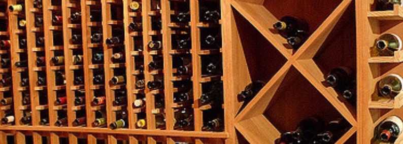 wooden racks with wine bottles