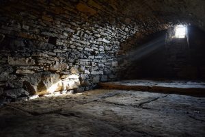 stone cellar, vent, single window, sunlight. stone wine cellar