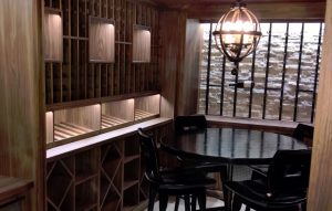 wooden racks and metal racks in modern wine cellar Toronto