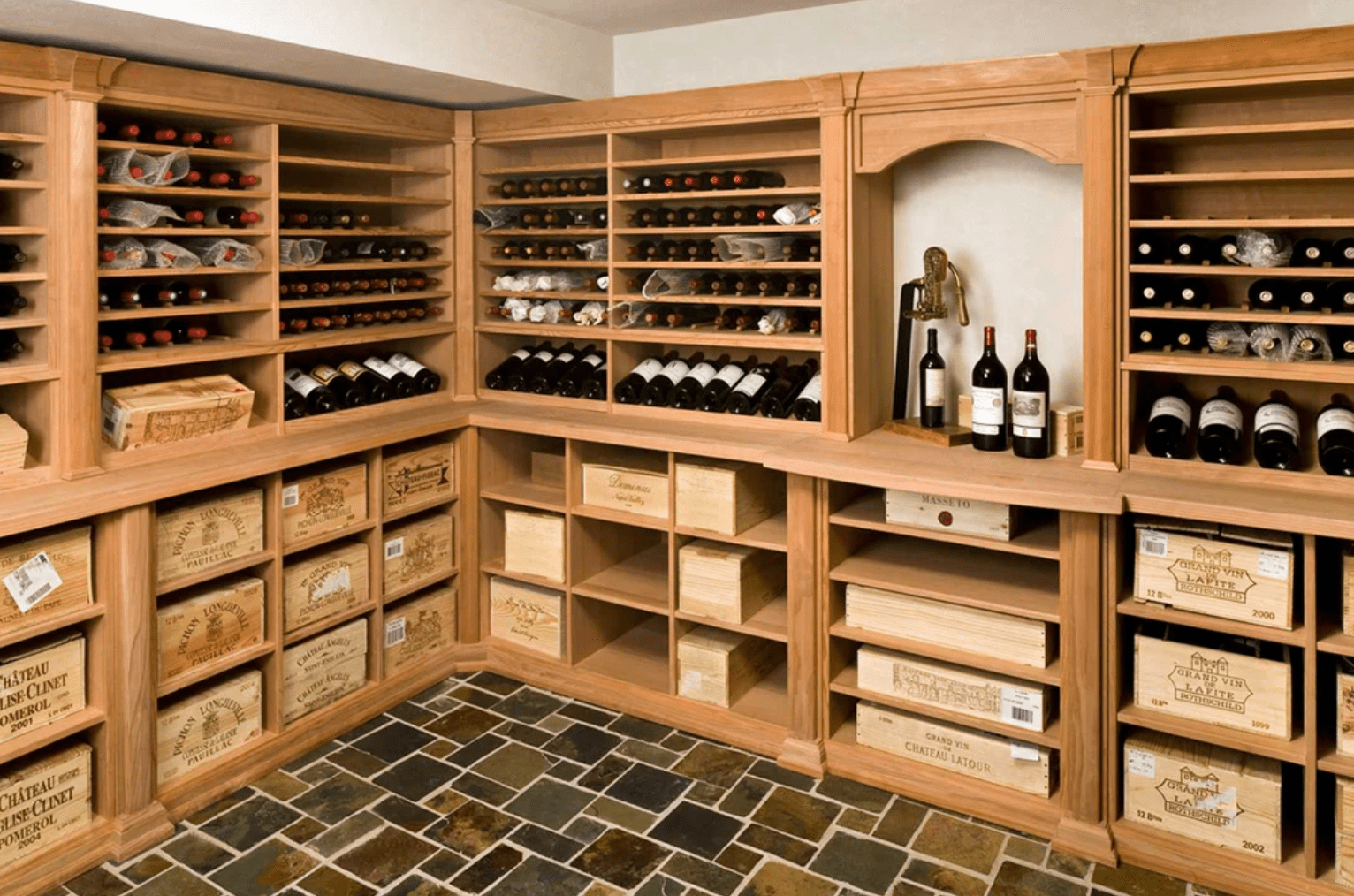 Custom wooden wine cellar stocked with many valuable vintage wines.
