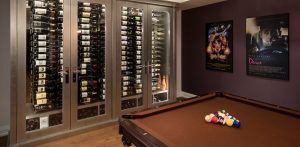 wine cellar in billiards room of upscale home