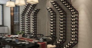 VintageView Vino Pins Flex 45 Metal Wine Rack arranged in pristine order behind a desk.
